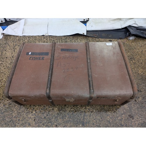 408 - A Vintage brown canvas steamer trunk with metal straps