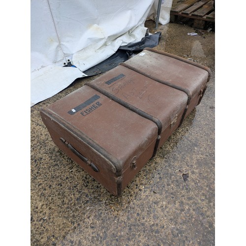 408 - A Vintage brown canvas steamer trunk with metal straps