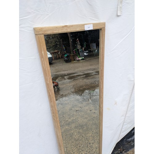 412 - An oak upstanding mirror