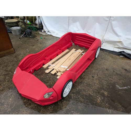 411 - A Children's red Ferrari bed