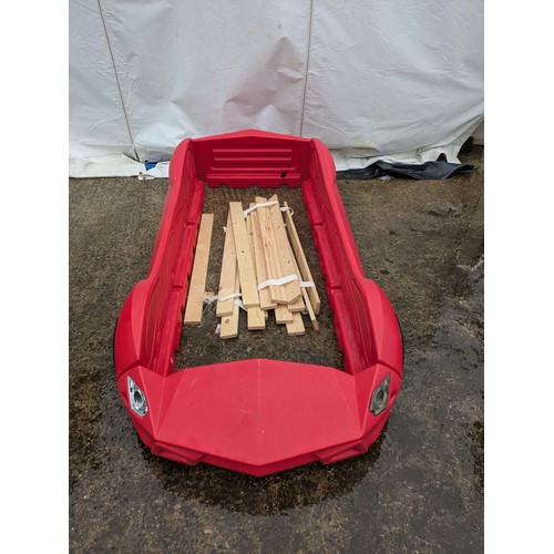 411 - A Children's red Ferrari bed