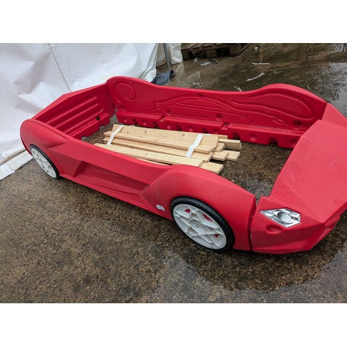 411 - A Children's red Ferrari bed