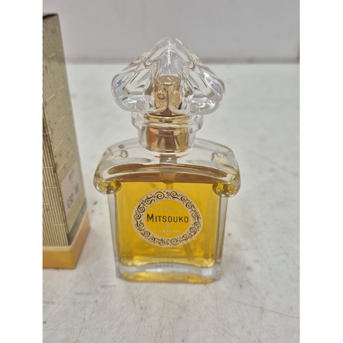 843 - A boxed Guerlain Paris Mitsouko Eau De Parfum in original box - appears unused - 30ml