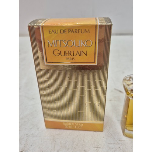 843 - A boxed Guerlain Paris Mitsouko Eau De Parfum in original box - appears unused - 30ml