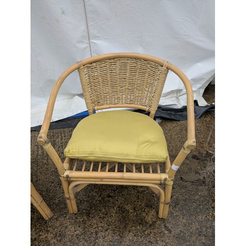 426 - A Pair of Wicker Conservatory Chairs With Yellow Cushions