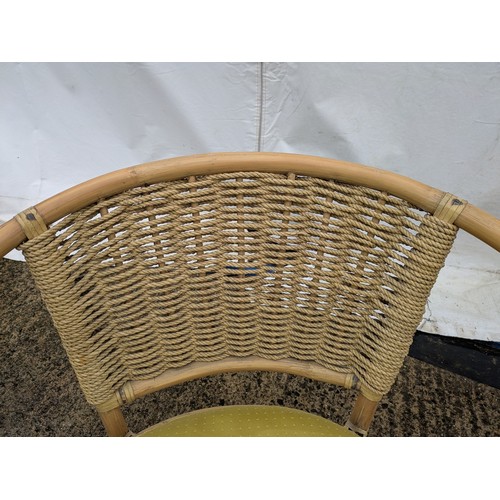 426 - A Pair of Wicker Conservatory Chairs With Yellow Cushions