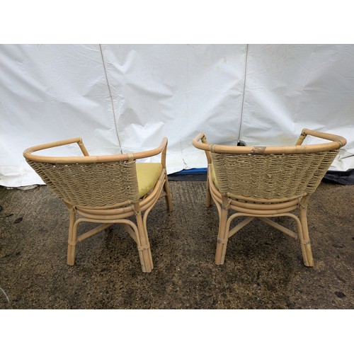 426 - A Pair of Wicker Conservatory Chairs With Yellow Cushions