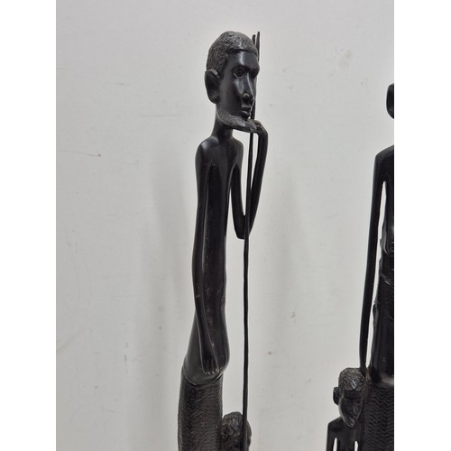 1919 - A pair of African Tribal figures in an Ebony wood