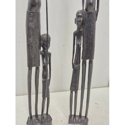 1919 - A pair of African Tribal figures in an Ebony wood