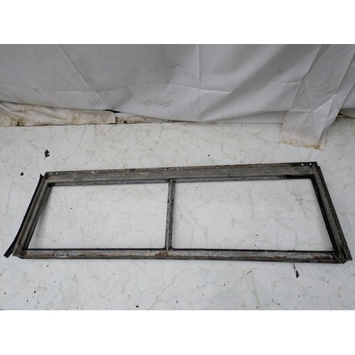 33 - An aluminium land-rover defender rear window frame