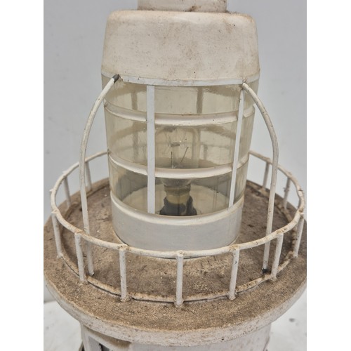 804 - A steel bespoke lighthouse table lamp