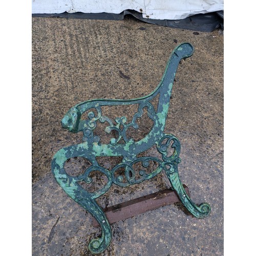 38 - A pair cast iron bench ends with lion head motifs