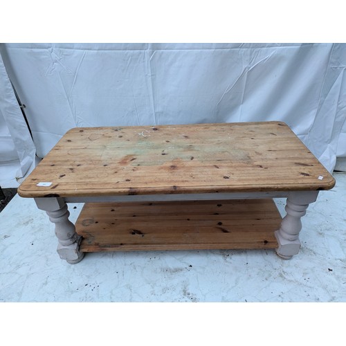 407 - A pine coffee table with storage area underneath