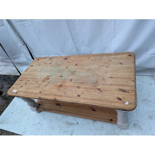 407 - A pine coffee table with storage area underneath