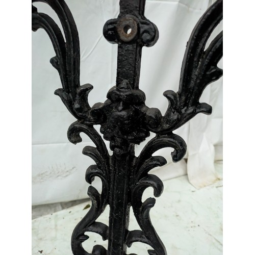 39 - A selection of 3 cast iron table legs