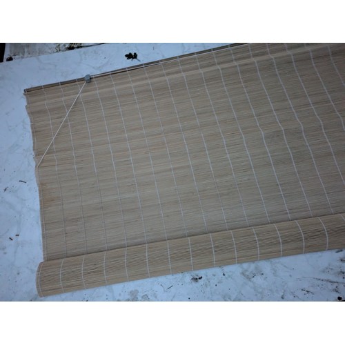 518 - A large bamboo roller window blind