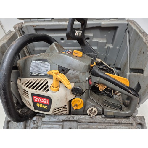 10 - A partially disassembled Ryobi 40cc petrol chainsaw in hard carry case