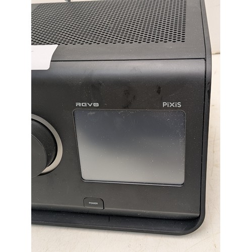 1272 - A REVO pixis iron alarm clock radio