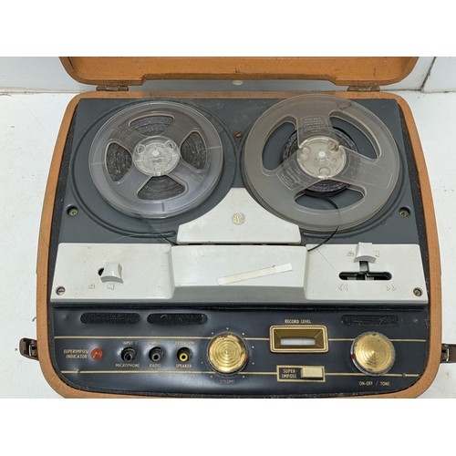 1274 - A vintage defiant BSR reel to reel player jn a brown leather covered case