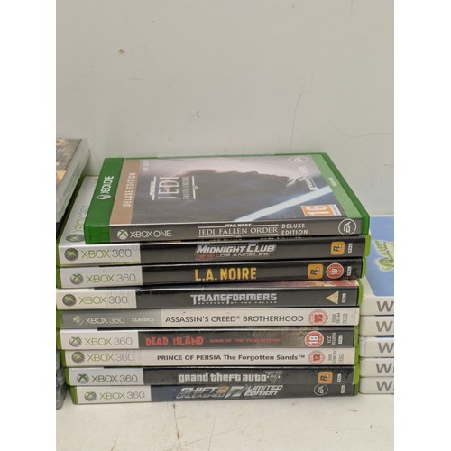 1265 - A large selection of video games, ps3, Xbox and Wii