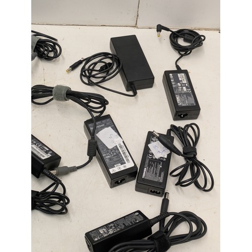 1276 - A selection of various laptop chargers