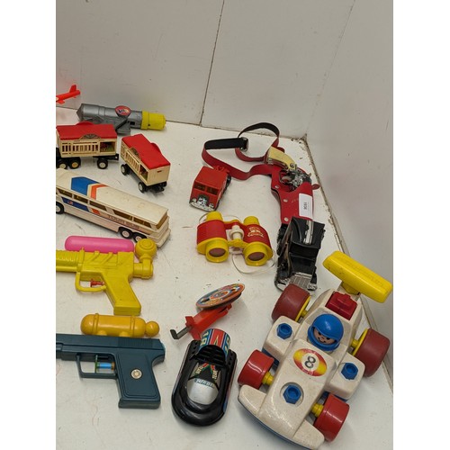 1936 - A selection. Of vintage 1970s toys including cap gun, vehicles etc