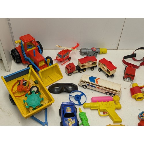 1936 - A selection. Of vintage 1970s toys including cap gun, vehicles etc