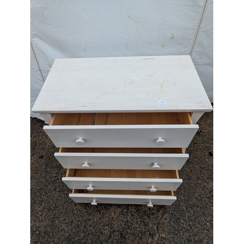 510 - A modern white chest of drawers with 4 drawers