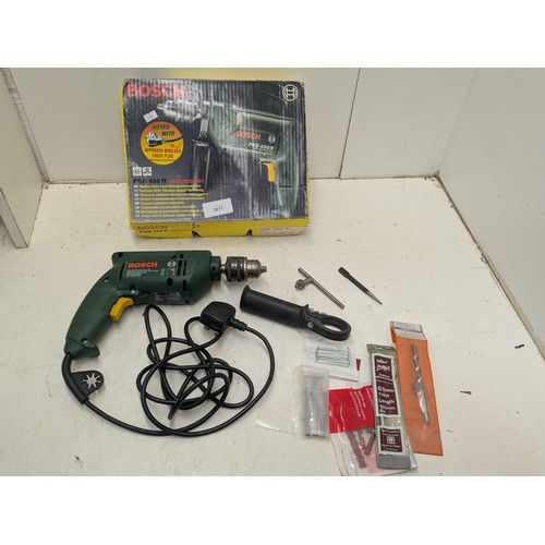 1611 - A Bosch PSB540r corded drill in box