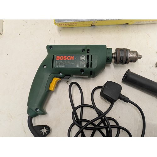 1611 - A Bosch PSB540r corded drill in box