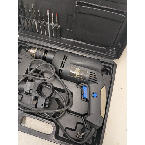 1610 - A PowerBase Corded drill in case with accessories