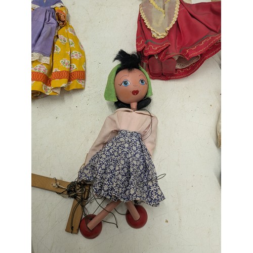 858 - A Selection of Various vintage dolls and puppets