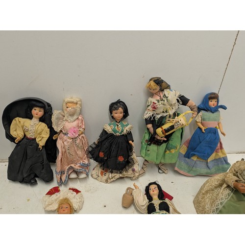 858 - A Selection of Various vintage dolls and puppets