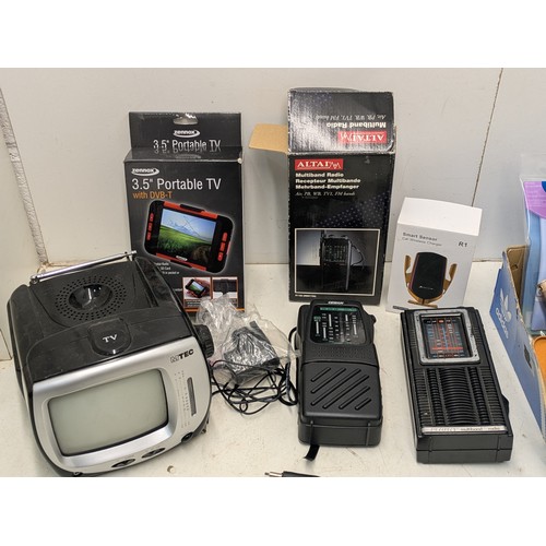 1282 - A Selection of Various electronics including wireless chargers, multi band radios and a mini TV