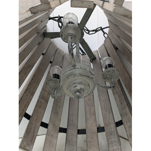 859 - An interesting steel and oak cylindrical hanging light fixture with an internal 3 branch light holde... 