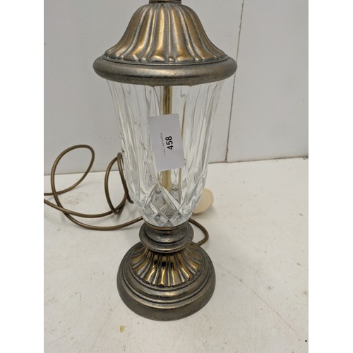 458 - A interesting brass and glass table lamp