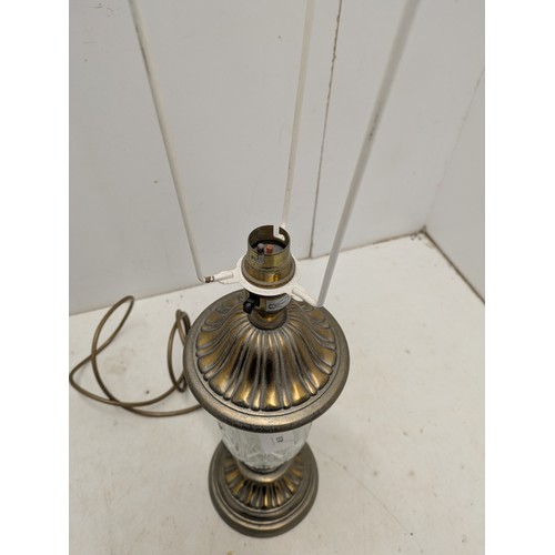 458 - A interesting brass and glass table lamp