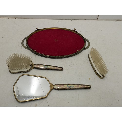 863 - An oriental Japanese style dressing table set with mirror, brushes and tray