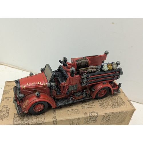 868 - A Popular imports Inc 1999 figure if an American Fire engine in original box