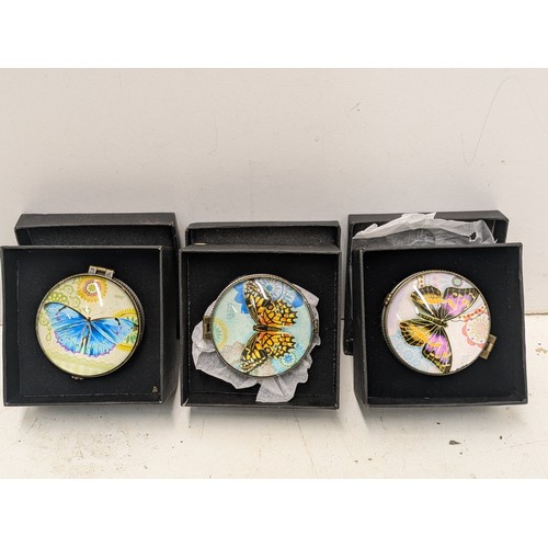 870 - A Selection of 3 butterfly glass topped and ceramic based trinket bowls in original presentation box... 