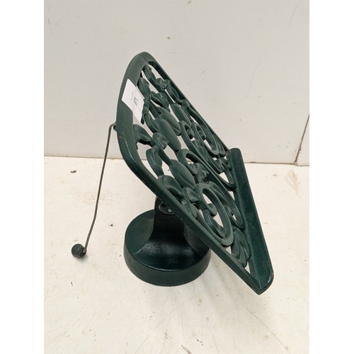 871 - A cast iron floral book stand in green