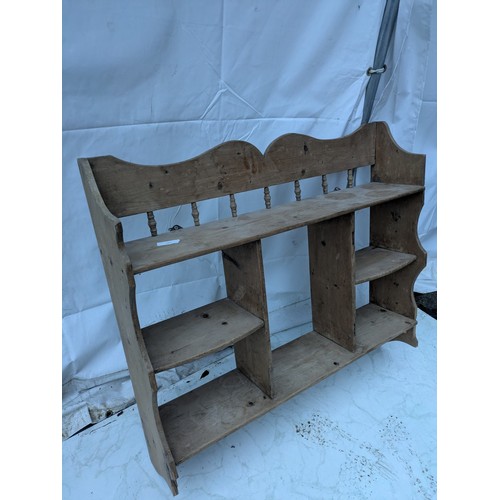 281 - An early 20th century pine Shelving Unit with spoked back and scalloped edges