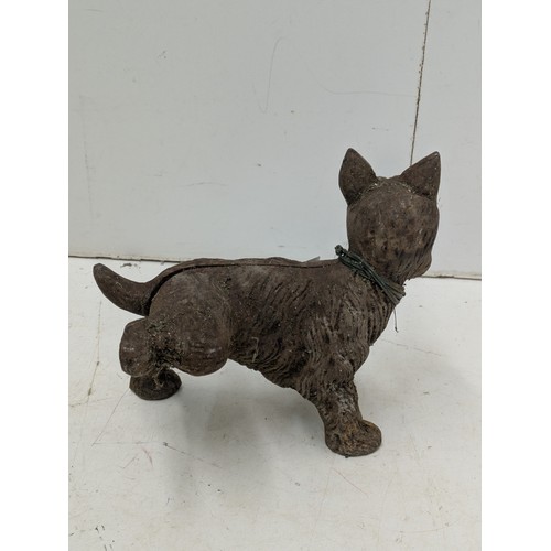 874 - A cast iron dog door stop