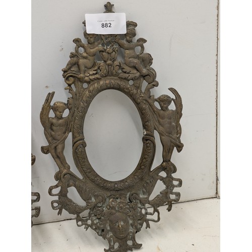 882 - A Pair of antique French brass picture frames