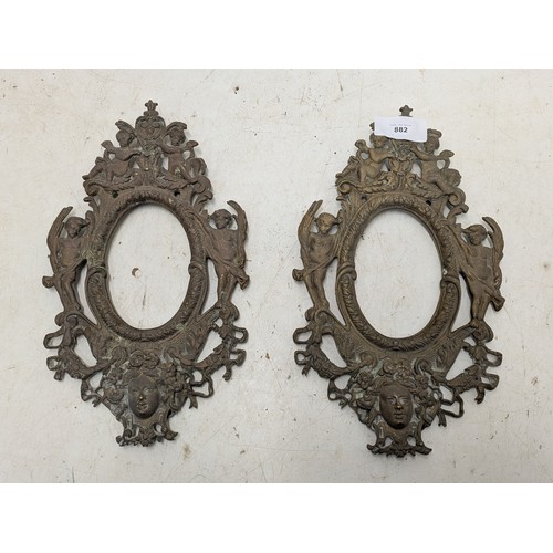 882 - A Pair of antique French brass picture frames