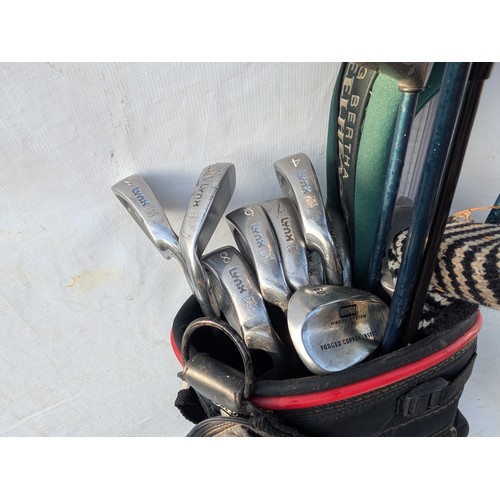 242 - A Selection of 8 Golf Clubs including a Variety of Yonex Clubs