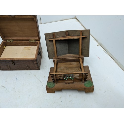 1024 - A Selection of various boxes including a music box and one depicting a log cabin