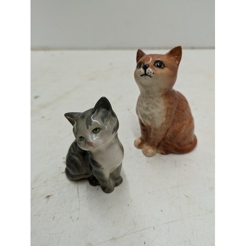 2114 - A Pair of Beswick Porcelain Cat Figures