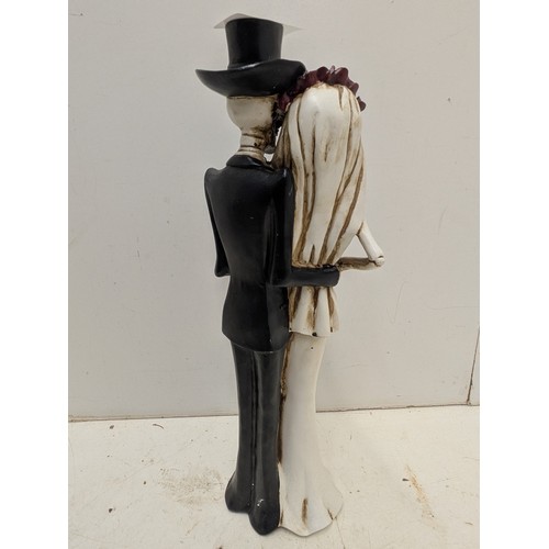 1967 - A resin figure of a skeleton bride and groom.