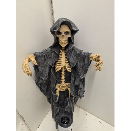 1970 - A 1997 Marka Gallery skeleton candle holder figure